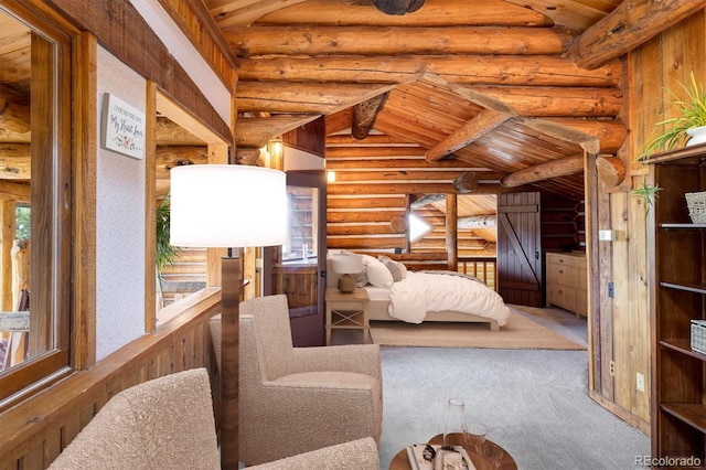 carpeted bedroom with lofted ceiling with beams and wooden ceiling