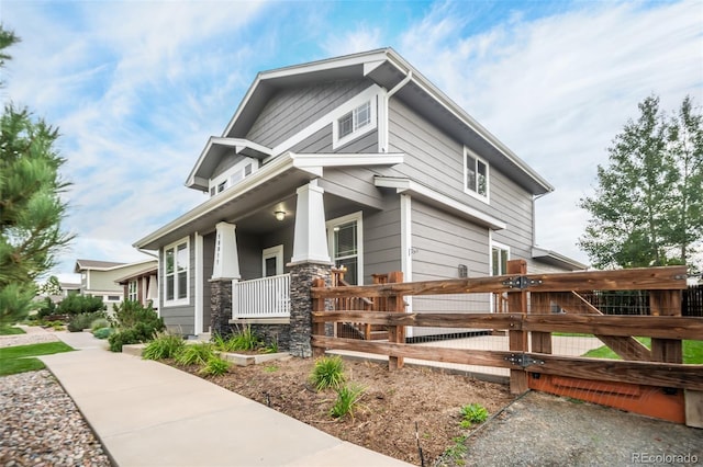 view of property exterior featuring a porch