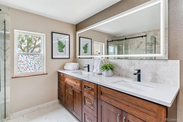 40192 Margaret Dr, Elizabeth, CO 80107 - full bath featuring double vanity, baseboards, a stall shower, and a sink