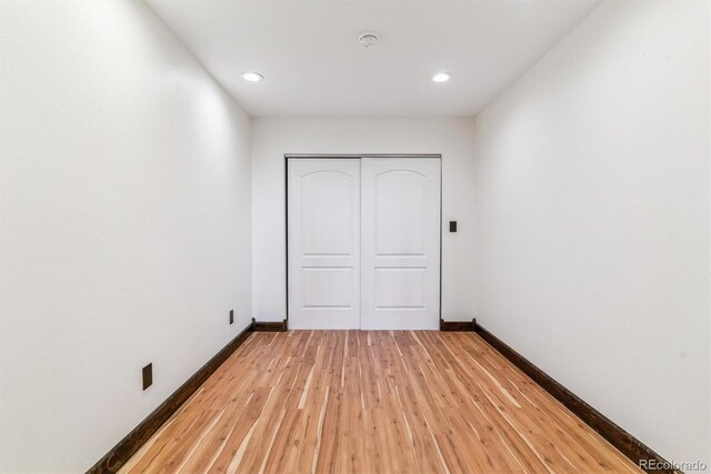 40192 Margaret Dr, Elizabeth, CO 80107 - unfurnished bedroom featuring light wood-style flooring, baseboards, and recessed lighting