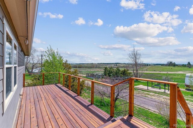 40192 Margaret Dr, Elizabeth, CO 80107 - wooden terrace featuring a rural view