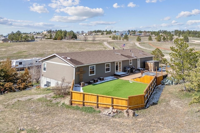 40192 Margaret Dr, Elizabeth, CO 80107 - rear view of property with a yard, a wooden deck, and a fenced backyard