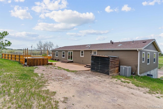 40192 Margaret Dr, Elizabeth, CO 80107 - back of house featuring central AC unit, a patio, and fence