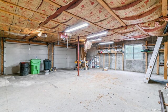 40192 Margaret Dr, Elizabeth, CO 80107 - garage featuring a garage door opener