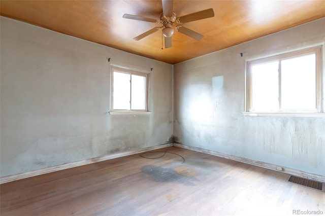 1335 Locust St, Denver, CO 80220 - spare room with wood finished floors and a ceiling fan