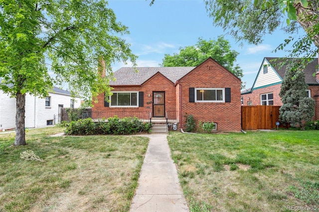 1335 Locust St, Denver, CO 80220 - view of front facade with brick siding