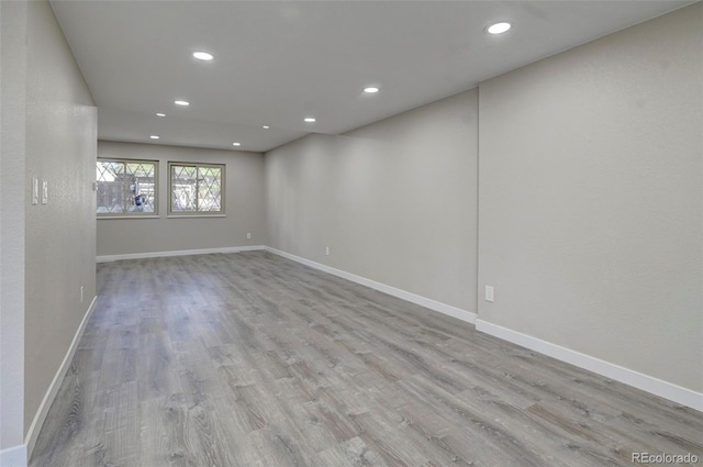 empty room with light hardwood / wood-style floors