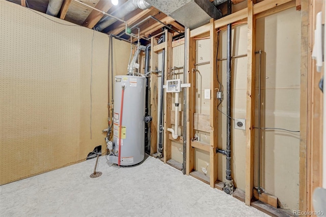 utility room featuring water heater