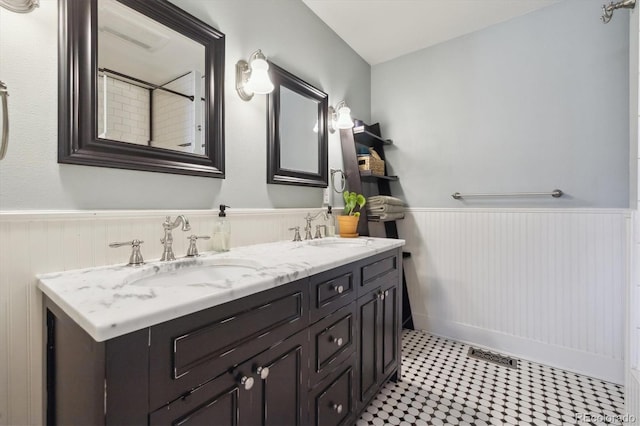 bathroom with vanity and tile patterned floors