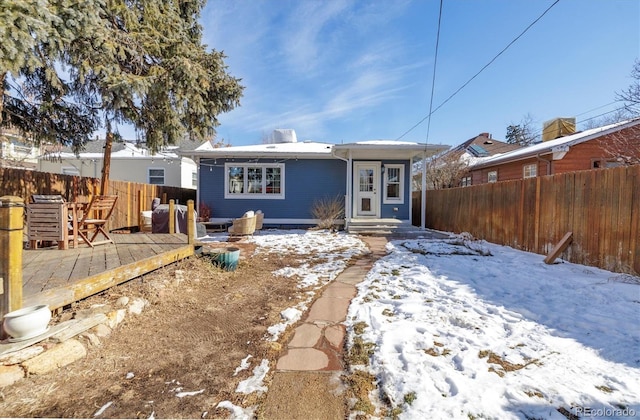 view of snow covered property