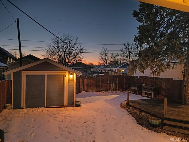 view of yard featuring an outbuilding and a fenced backyard