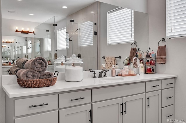 bathroom with vanity and walk in shower