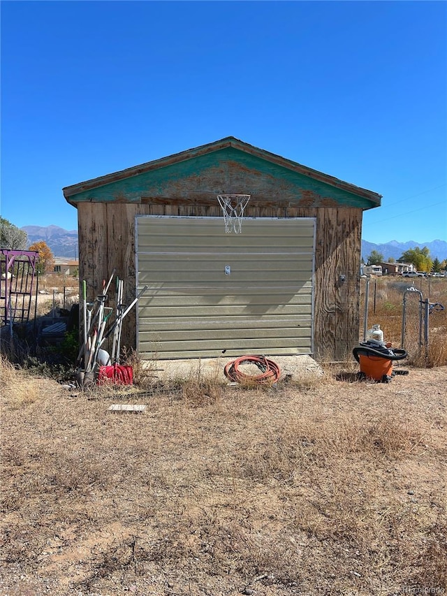 view of shed featuring a mountain view