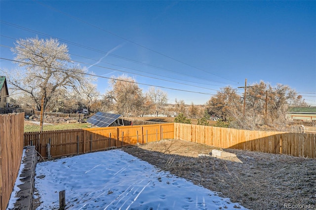 view of yard covered in snow