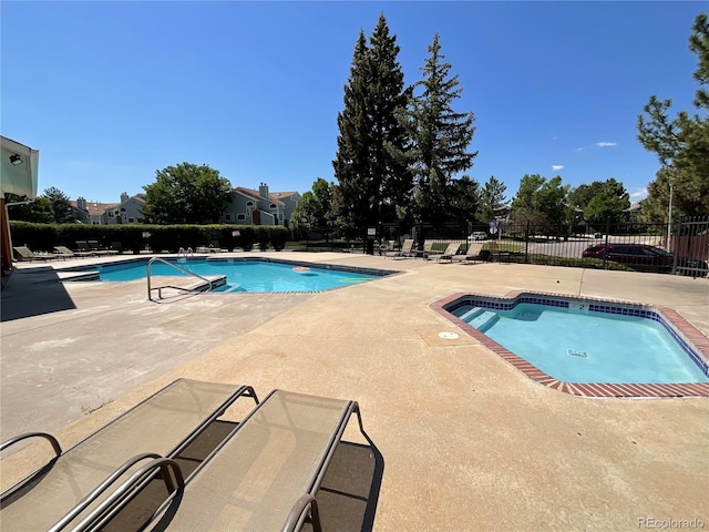5550 W 80th Pl Unit 20, Arvada, CO 80003 - community pool featuring a patio