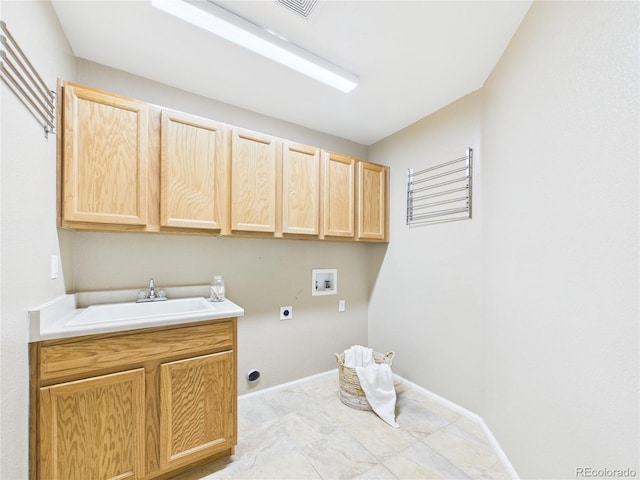 laundry area with hookup for a washing machine, hookup for an electric dryer, a sink, baseboards, and cabinet space