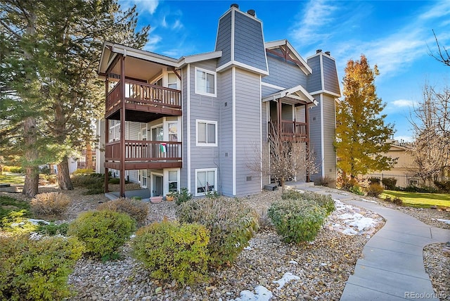 exterior space featuring a balcony