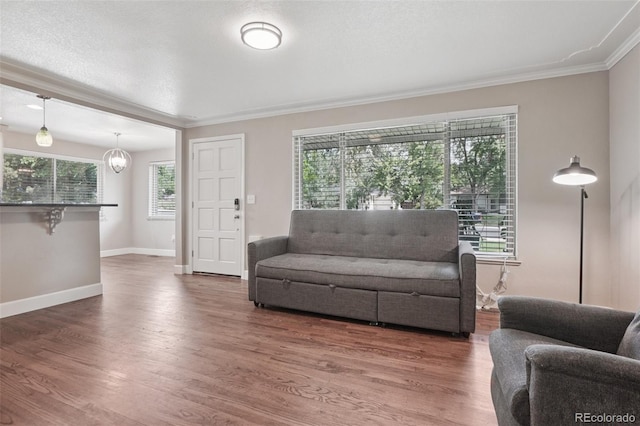 7650 W 24th Ave, Lakewood, CO 80214 - living area with ornamental molding and wood finished floors