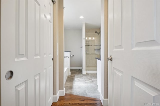 7650 W 24th Ave, Lakewood, CO 80214 - corridor featuring baseboards