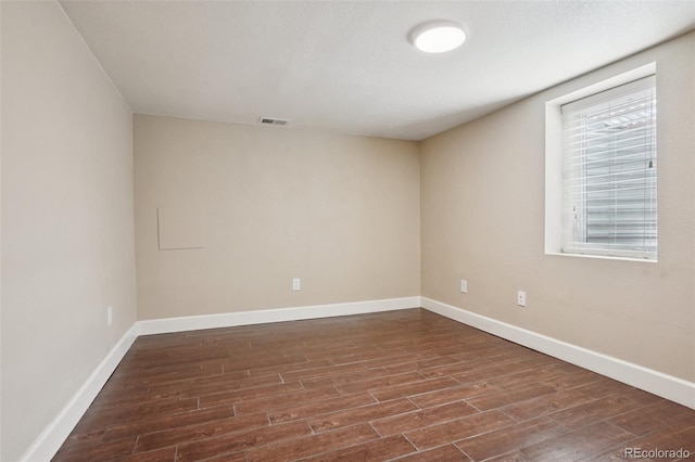 7650 W 24th Ave, Lakewood, CO 80214 - unfurnished room with dark wood-style floors