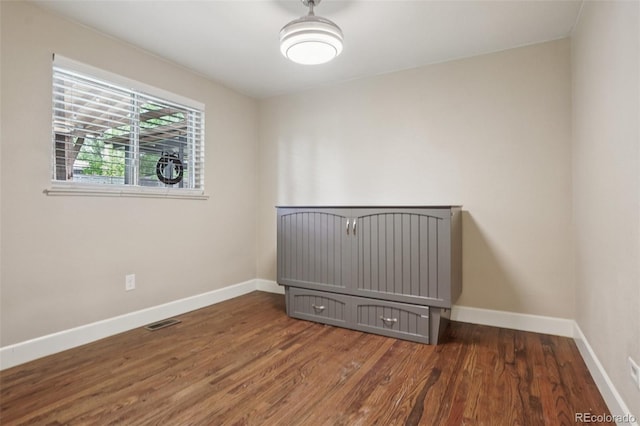 7650 W 24th Ave, Lakewood, CO 80214 - empty room featuring wood finished floors and baseboards