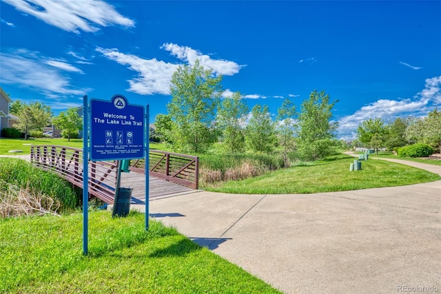 surrounding community featuring a lawn