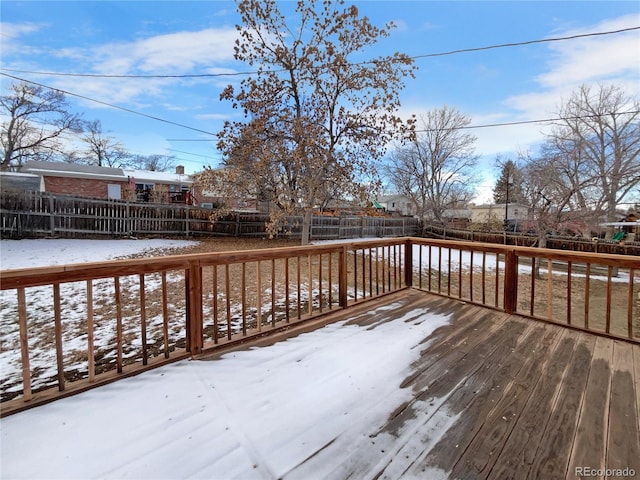 view of snow covered deck