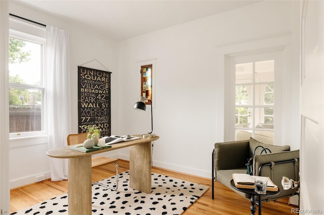 4224 N Clay St, Denver, CO 80211 - home office featuring light wood-type flooring and baseboards