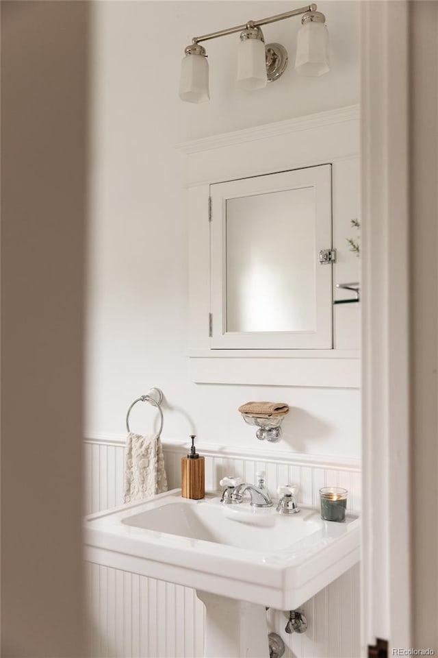 4224 N Clay St, Denver, CO 80211 - bathroom featuring a wainscoted wall