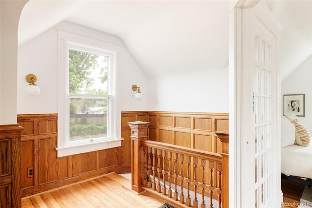 4224 N Clay St, Denver, CO 80211 - bonus room featuring lofted ceiling, light wood finished floors, a wainscoted wall, and wooden walls