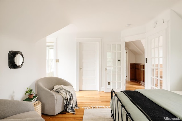 4224 N Clay St, Denver, CO 80211 - bedroom with light wood finished floors and french doors