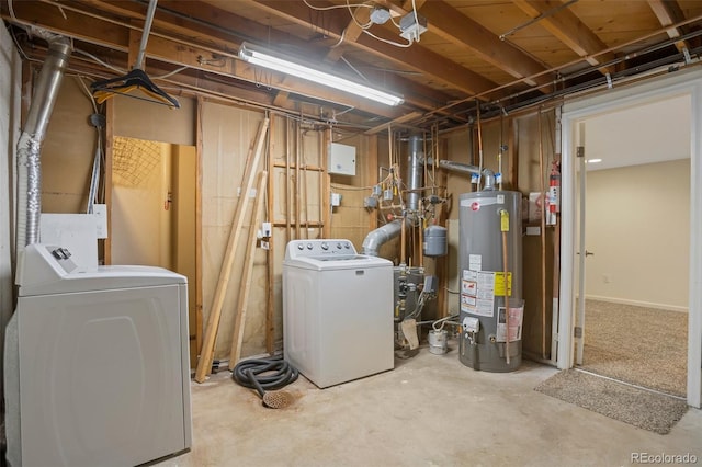 basement featuring water heater and washer and dryer