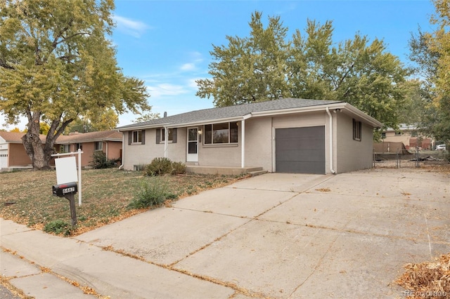 single story home featuring a garage