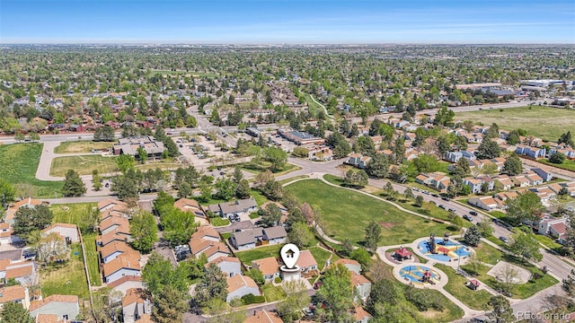 aerial view of property's location with nearby suburban area