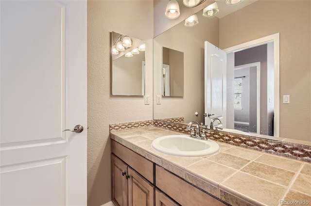 bathroom featuring vanity