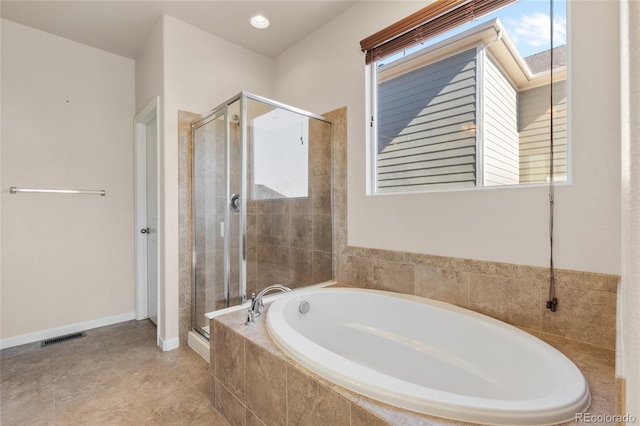 full bath featuring a stall shower, baseboards, visible vents, tile patterned floors, and a garden tub