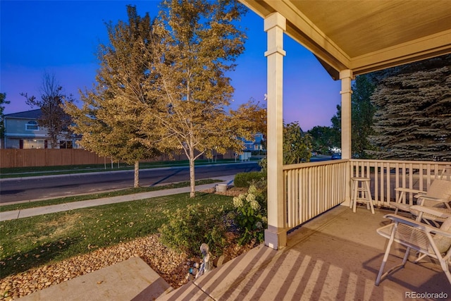 view of patio terrace at dusk