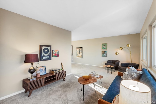 living room with carpet flooring and baseboards