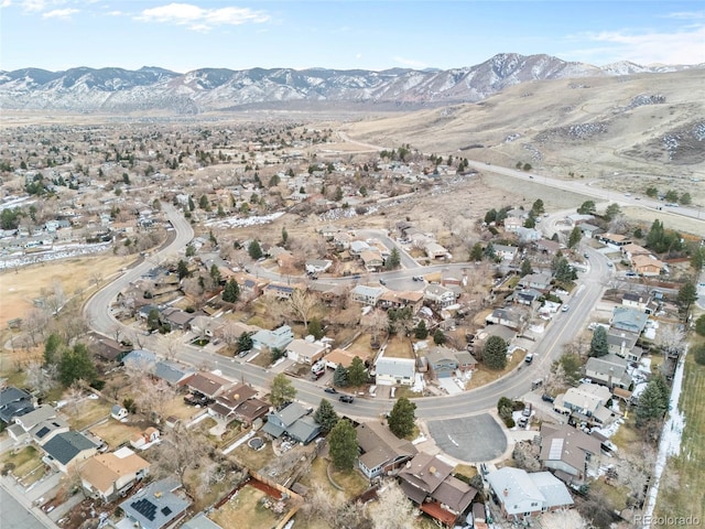 drone / aerial view with a residential view and a mountain view