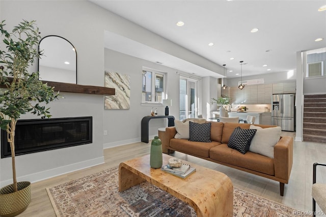 living room with light hardwood / wood-style floors