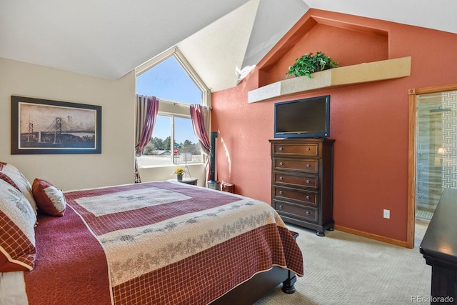 bedroom featuring lofted ceiling, baseboards, and carpet floors