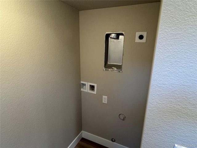 laundry room featuring hookup for an electric dryer, hardwood / wood-style floors, and washer hookup