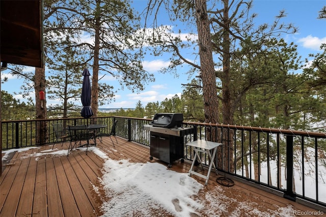 723 Eaton Rd, Palmer Lake, CO 80133 - snow covered deck with outdoor dining area