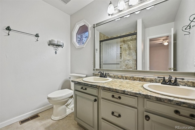 723 Eaton Rd, Palmer Lake, CO 80133 - bathroom featuring visible vents, toilet, a stall shower, and a sink