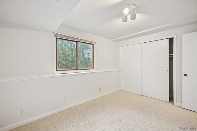 723 Eaton Rd, Palmer Lake, CO 80133 - unfurnished bedroom featuring carpet, a closet, and baseboards