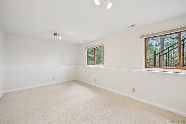 723 Eaton Rd, Palmer Lake, CO 80133 - carpeted empty room featuring baseboards and visible vents