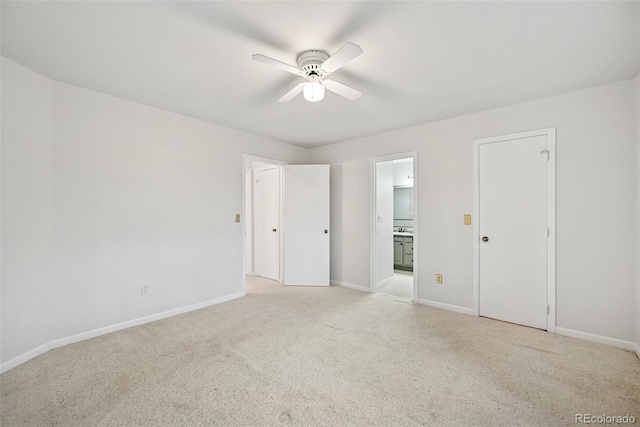 723 Eaton Rd, Palmer Lake, CO 80133 - unfurnished bedroom with a ceiling fan, baseboards, light carpet, and connected bathroom