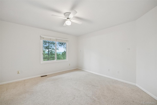 723 Eaton Rd, Palmer Lake, CO 80133 - empty room with ceiling fan, baseboards, visible vents, and light carpet