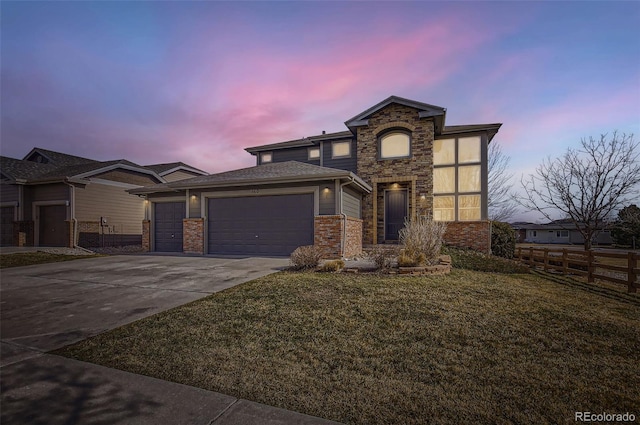 view of front of property with a garage, brick siding, fence, concrete driveway, and a front lawn