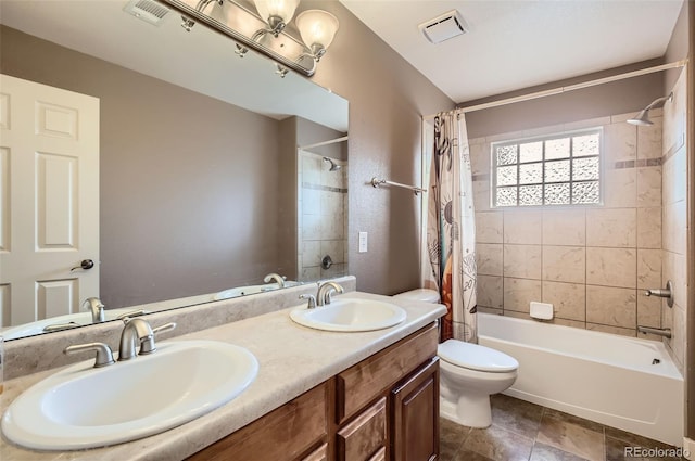 full bath with shower / bath combination with curtain, visible vents, and a sink